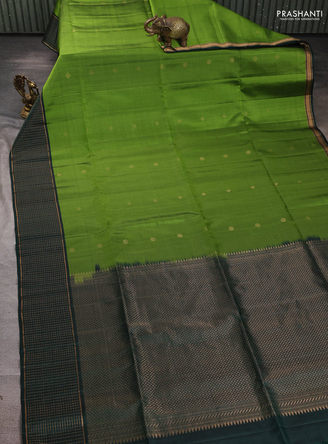 Pure soft silk saree light green and bottle green with zari woven buttas and zari woven checked border