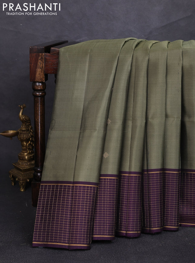 Pure soft silk saree olive green and violet with zari woven buttas and zari woven checked border