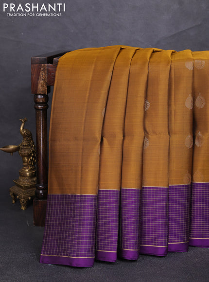 Pure soft silk saree dark mustard and purple with zari woven buttas and zari woven checked border