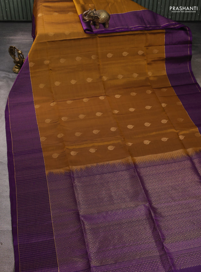 Pure soft silk saree dark mustard and purple with zari woven buttas and zari woven checked border