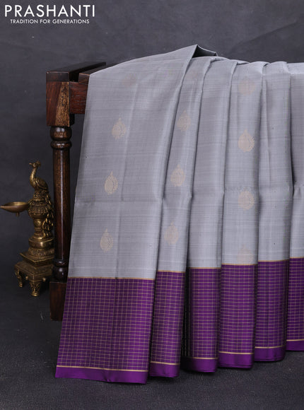 Pure soft silk saree grey and purple with zari woven buttas and zari woven checked border