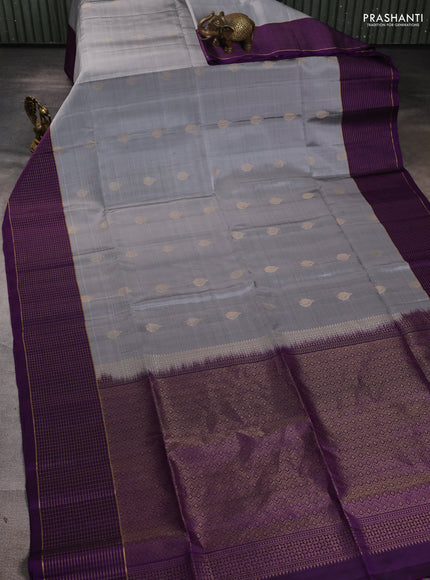 Pure soft silk saree grey and purple with zari woven buttas and zari woven checked border