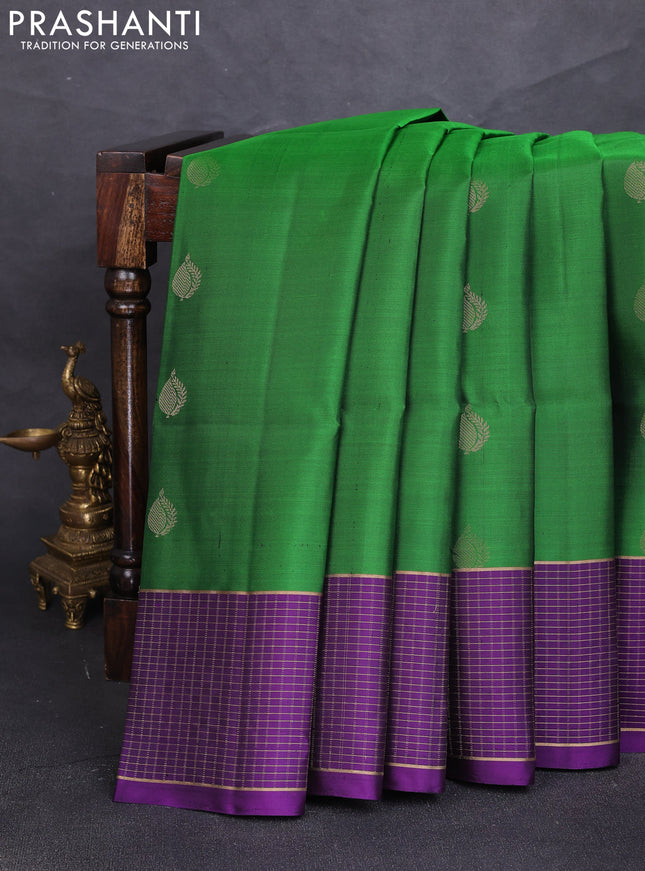 Pure soft silk saree green and purple with zari woven buttas and zari woven checked border