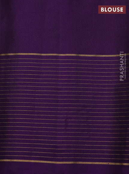 Pure soft silk saree green and purple with zari woven buttas and zari woven checked border