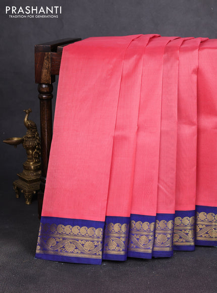 Silk cotton saree peach pink and blue with plain body and zari woven korvai border