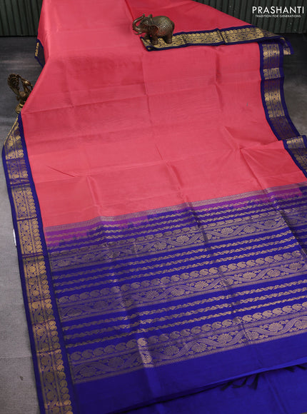 Silk cotton saree peach pink and blue with plain body and zari woven korvai border
