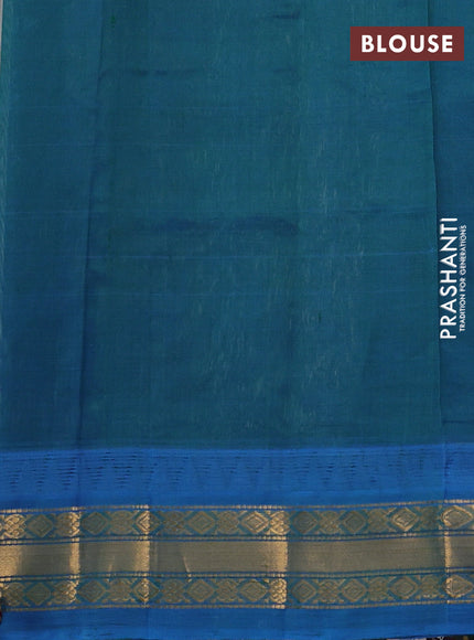 Silk cotton saree off white and cs blue with zari woven buttas and temple design zari woven korvai border