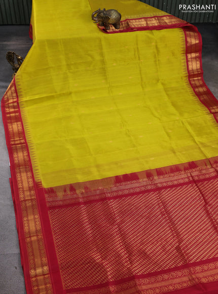 Silk cotton saree yellow and red with zari woven buttas and temple design zari woven korvai border
