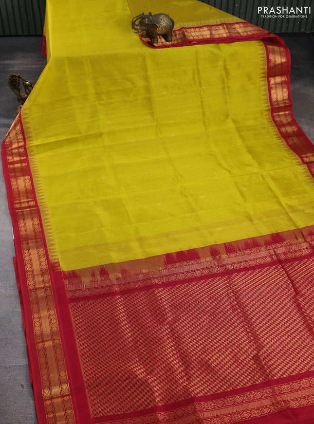 Silk cotton saree yellow and red with zari woven buttas and temple design zari woven korvai border