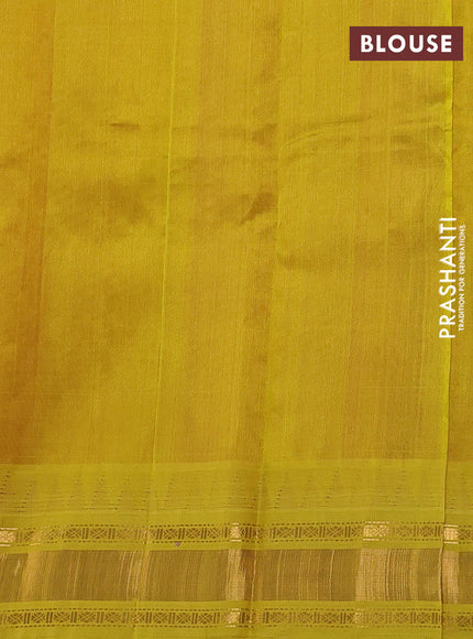 Silk cotton saree pink and lime yellow with allover zari woven checked pattern and temple design zari woven korvai border