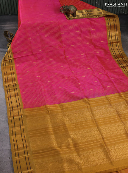 Silk cotton saree dual shade of candy pink and dark ustard with allover zari checks & buttas and zari woven korvai border