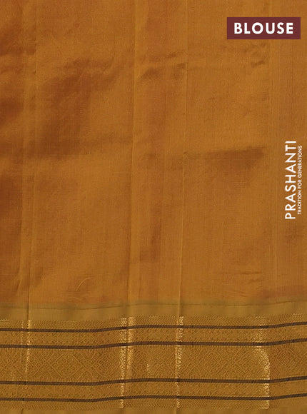 Silk cotton saree dual shade of candy pink and dark ustard with allover zari checks & buttas and zari woven korvai border