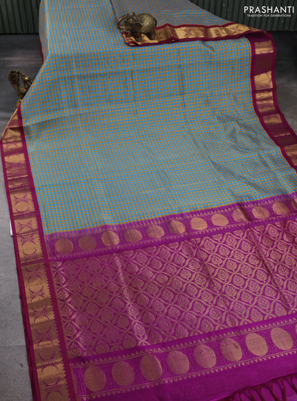 Silk cotton saree blue yellow and purple with allover small checked pattern and rudhraksha zari woven korvai border