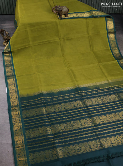 Silk cotton saree mehendi green and green with plain body and zari woven korvai border