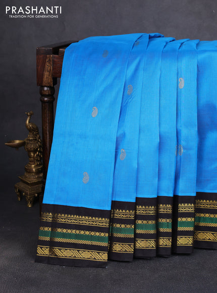 Silk cotton saree blue and black with paisley zari woven buttas and zari woven korvai border