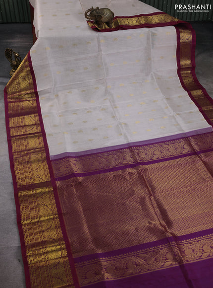 Silk cotton saree off white and wine shade with zari woven buttas and long zari woven korvai border
