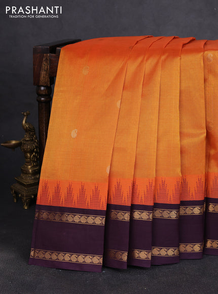 Silk cotton saree sunset orange and wine shade with paisley zari woven buttas and temple design rettapet zari woven korvai border