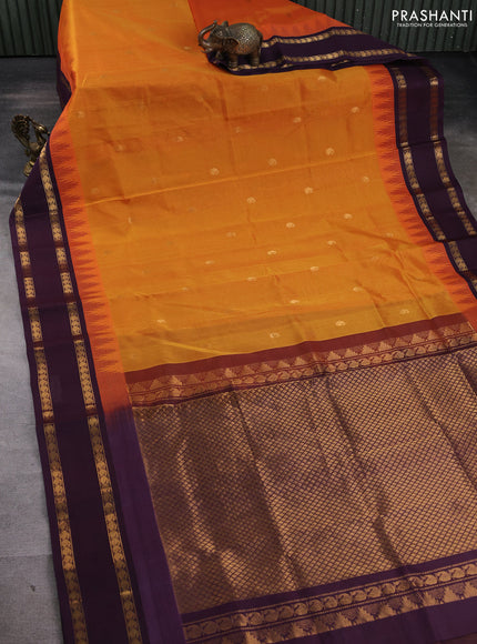 Silk cotton saree sunset orange and wine shade with paisley zari woven buttas and temple design rettapet zari woven korvai border