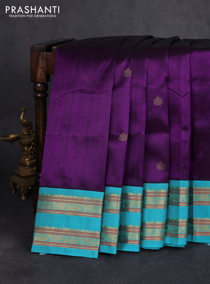 Silk cotton saree deep purple and teal blue with allover zari woven buttas and rettapet zari woven korvai border