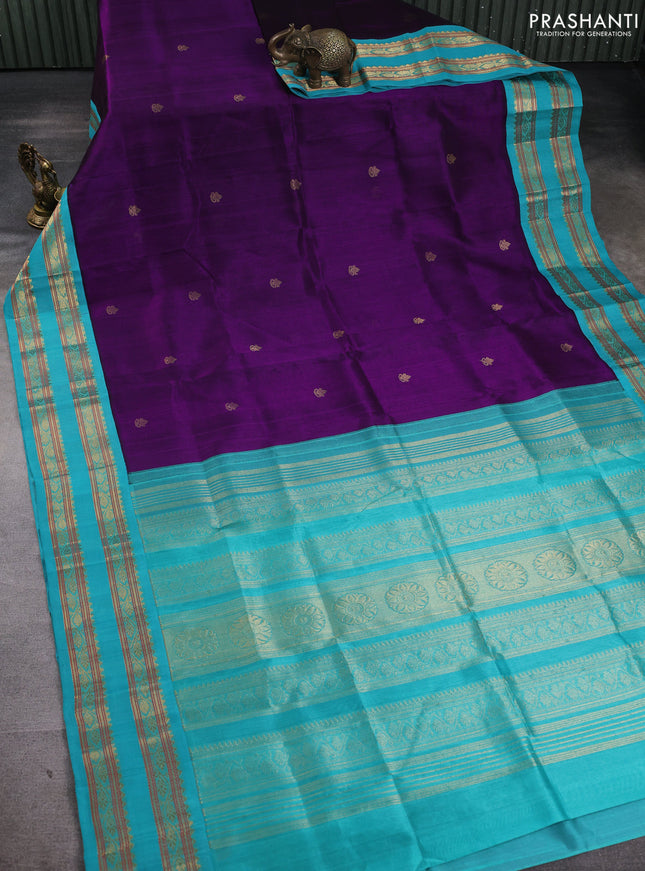 Silk cotton saree deep purple and teal blue with allover zari woven buttas and rettapet zari woven korvai border