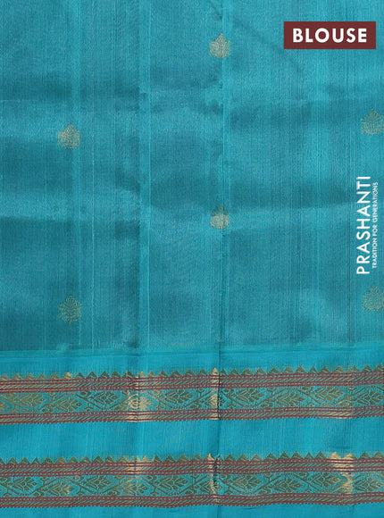 Silk cotton saree deep purple and teal blue with allover zari woven buttas and rettapet zari woven korvai border