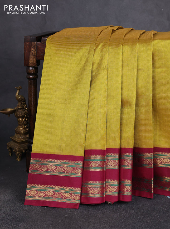 Silk cotton saree mustard green and maroon with allover vairaosi pattern and rettapet zari woven korvai border