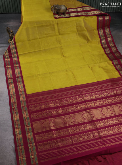 Silk cotton saree mustard green and maroon with allover vairaosi pattern and rettapet zari woven korvai border