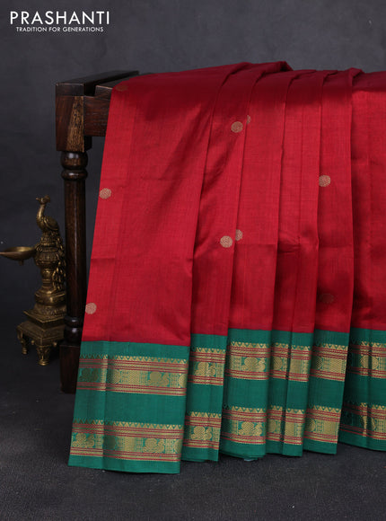 Silk cotton saree maroon and green with allover rudhraksha zari woven buttas and rettapet zari woven korvai border