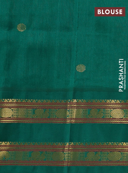 Silk cotton saree maroon and green with allover rudhraksha zari woven buttas and rettapet zari woven korvai border