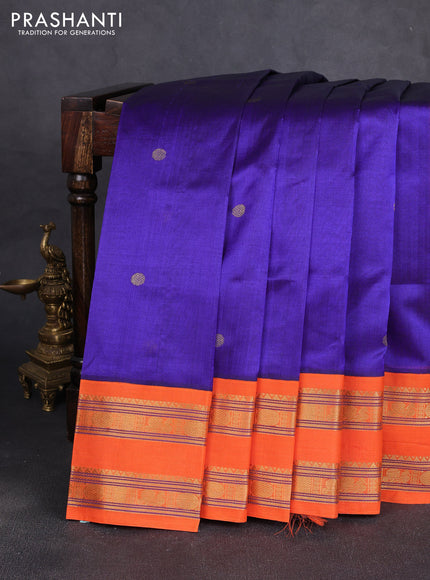Silk cotton saree blue and orange with allover rudhraksha zari woven buttas and rettapet zari woven korvai border