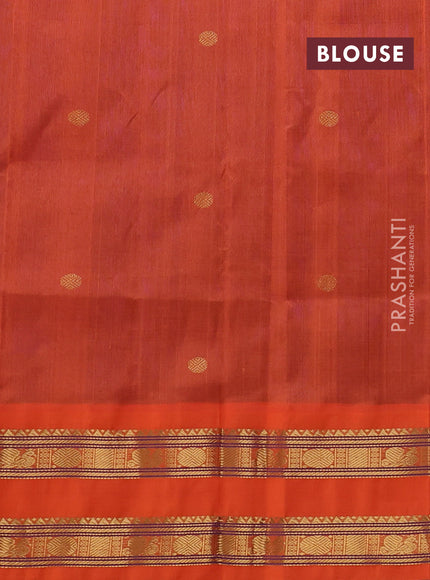 Silk cotton saree blue and orange with allover rudhraksha zari woven buttas and rettapet zari woven korvai border