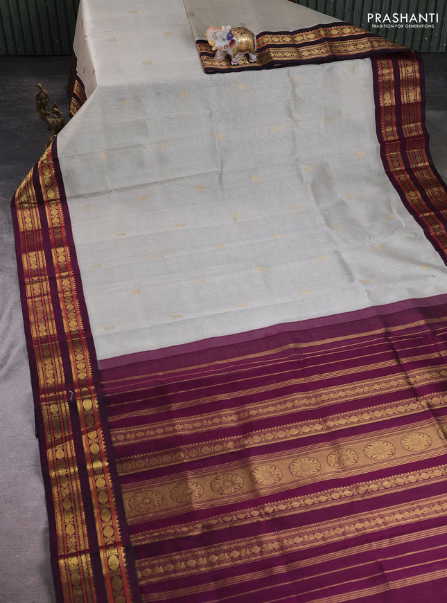 Silk cotton saree grey and wine with paisley zari woven buttas and rettapet zari woven korvai border