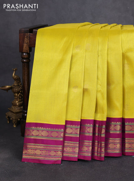 Silk cotton saree lime yellow and purple with paisley zari woven buttas and rettapet zari woven korvai border