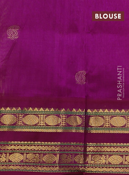 Silk cotton saree lime yellow and purple with paisley zari woven buttas and rettapet zari woven korvai border