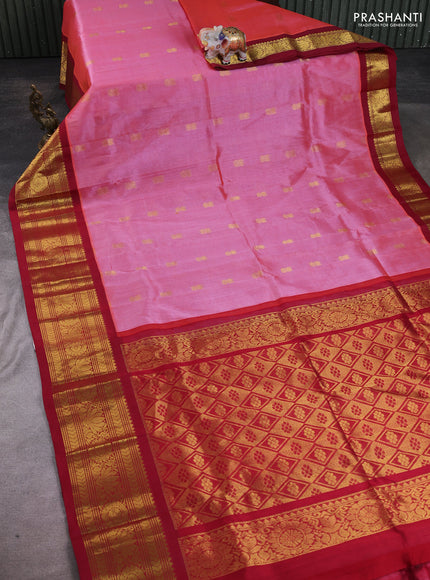 Silk cotton saree dual shade of pinkish red and maroon with allover zari woven buttas and long zari woven korvai border