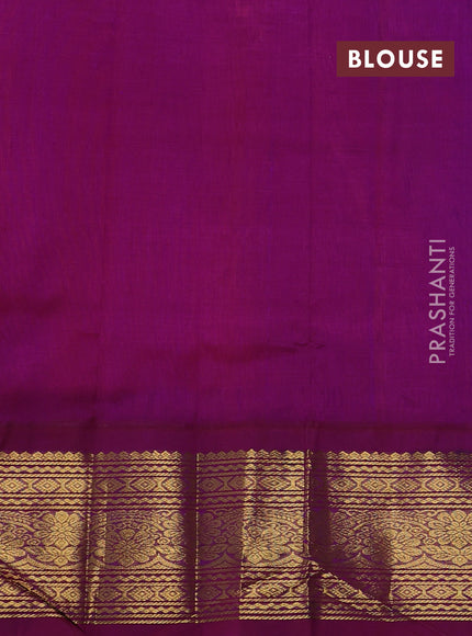 Silk cotton saree dual shade of pinkish orange and purple with allover zari woven buttas and long zari woven korvai border