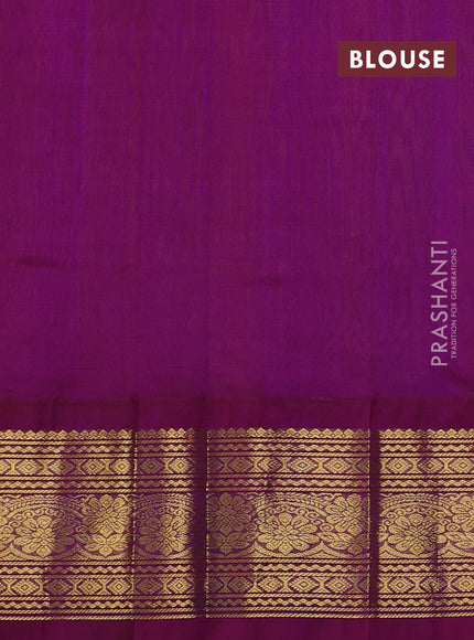 Silk cotton saree orange and purple with allover zari woven buttas and long zari woven korvai border