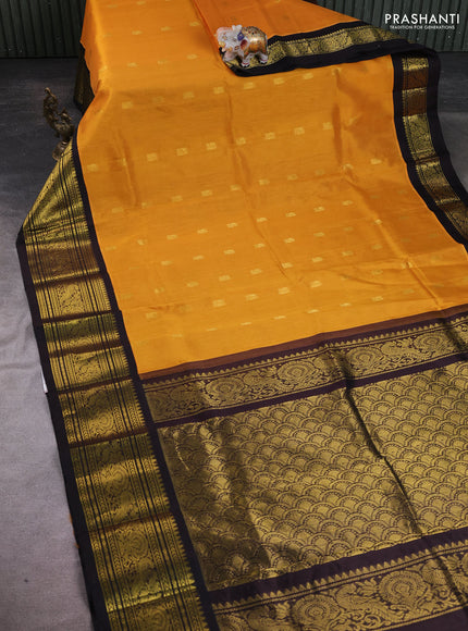 Silk cotton saree mustard yellow and black with annam zari woven buttas and long zari woven korvai border