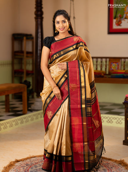 Silk cotton saree sandal and black with plain body and rettapet zari woven butta korvai border