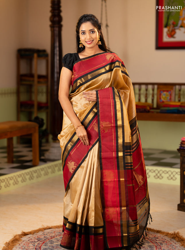 Silk cotton saree sandal and black with plain body and rettapet zari woven butta korvai border