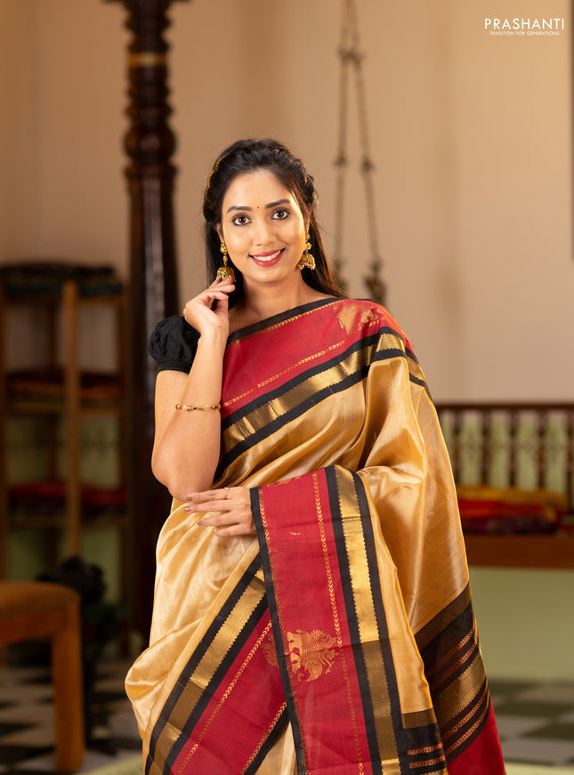Silk cotton saree sandal and black with plain body and rettapet zari woven butta korvai border