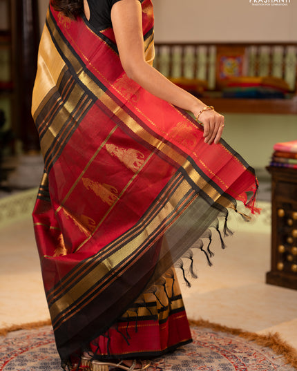 Silk cotton saree sandal and black with plain body and rettapet zari woven butta korvai border