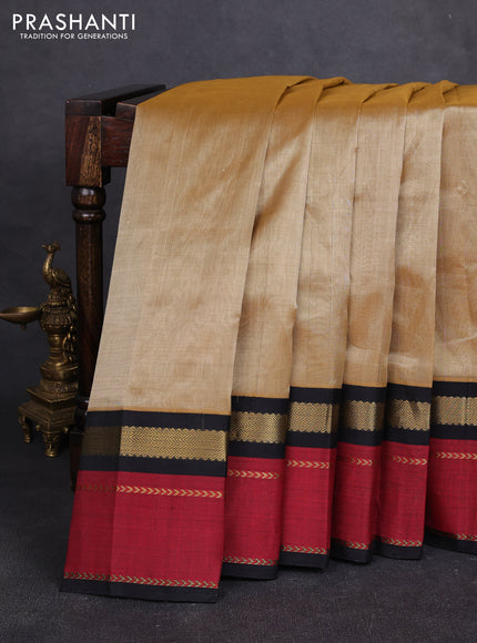 Silk cotton saree sandal and black with plain body and rettapet zari woven butta korvai border