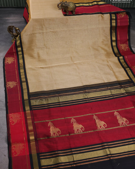 Silk cotton saree sandal and black with plain body and rettapet zari woven butta korvai border