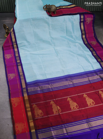 Silk cotton saree light teal blue and royal blue with plain body and rettapet zari woven butta korvai border