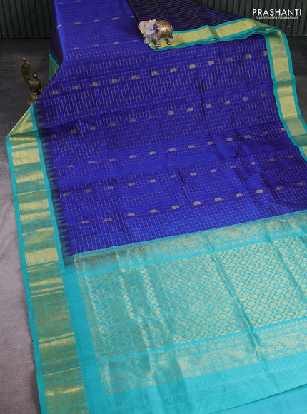 Silk cotton saree blue shade and teal blue with allover zari checks & buttas and temple design zari woven korvai border