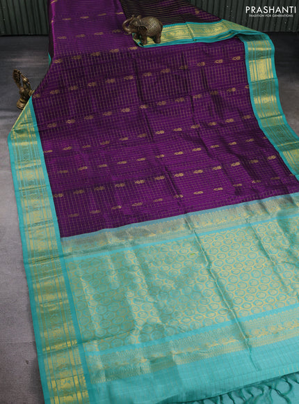 Silk cotton saree purple and teal blue with allover zari checks & buttas and zari woven korvai border