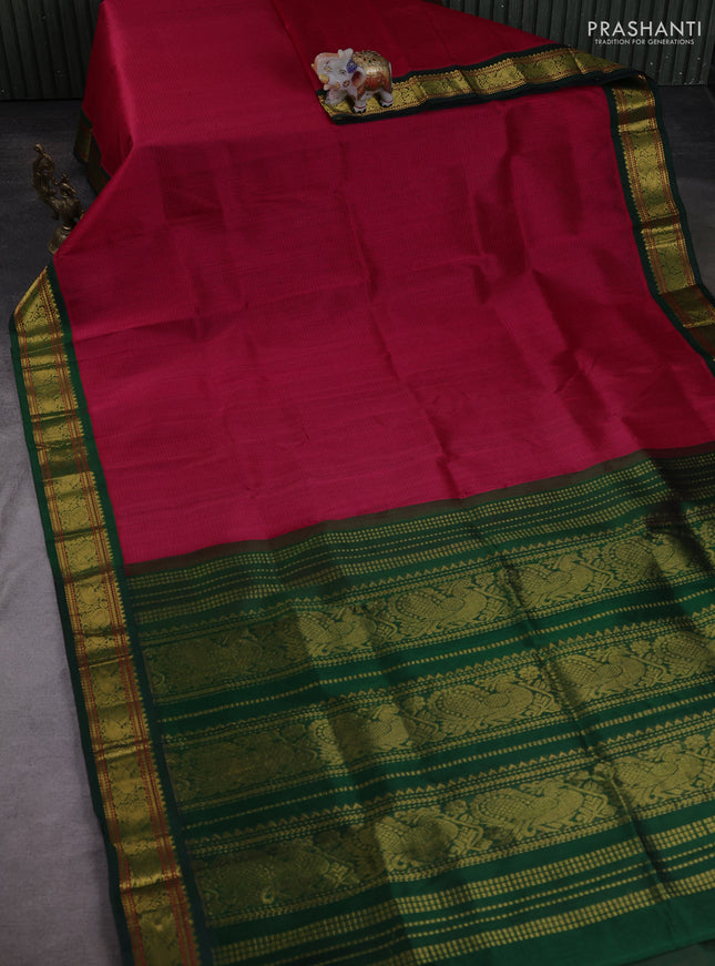 Silk cotton saree tomato pink and bottle green with allover small checked pattern and zari woven korvai border