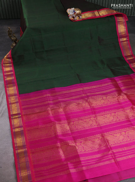 Silk cotton saree dark green and pink with allover small checked pattern and zari woven korvai border