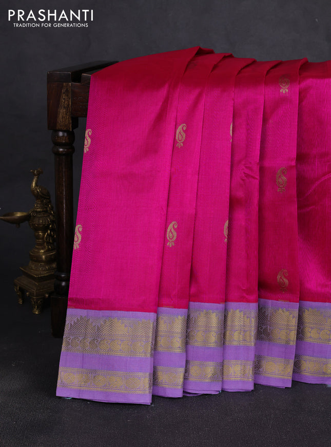 Silk cotton saree pink and lavender with allover paisley buttas and rettapet zari woven korvai border